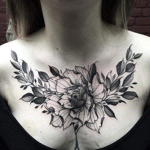 татуировки цветы на женских грудях